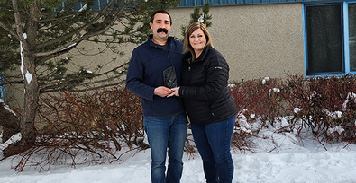 Past board trustee, Ben Appelt (L) with Christina Forth, board chair (R).